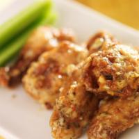 Garlic Parmesan Wings (6 Pcs.) · Crispy, fried wings smothered in addictive, garlicky cheesy sauce.