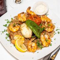 Shrimp Kabob · Jumbo shrimp seasoned a la mediterranean. Served with rice and salad.
