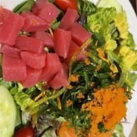 Hawaiian Poke Salad · Tuna, salmon, mixed fresh seaweed, okra, sesame soy dressing.
