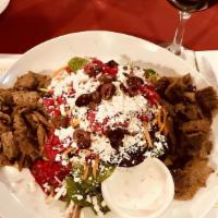 Greek Salad · Arcadian mix, cucumber, feta cheese, tomatoes, kalamata olives and fresh lemon oil vinaigret...