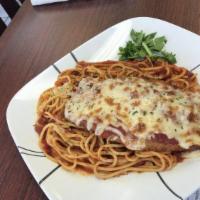 Spaghetti Bolognese · Spaghetti cooked in an Italian ragù (meat sauce) made with minced beef & tomatoes, served wi...