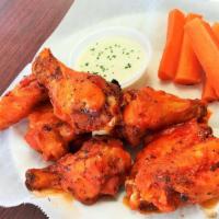 Hot Wings (20) · 20 wings. Choice of buffalo or barbecue sauce.