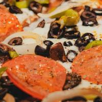 Veggie Supremo Pizza · Loaded with fresh onions, bell peppers, mushrooms, olives, and fresh tomatoes.