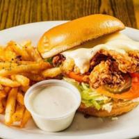 Nashville Hot Chicken Sandwich · NASHVILLE HOT CRISPY CHICKEN BREAST, LETTUCE, TOMATO & PICKLE. BUTTERMILK RANCH ON THE SIDE