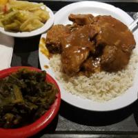 Smothered Pork Chop · Rice, 2 Sides and Cornbread