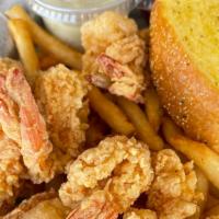 Fried Shrimp Platter · 9 shrimps served with french fries and a toast.