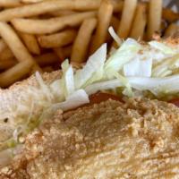 Fried Catfish Po-Boy · It comes with lettuce, tomatoes, pickles, mayo, and served with french fries.