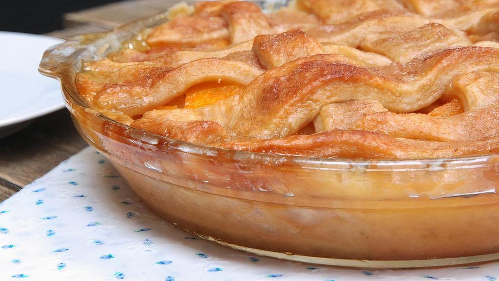Peach Cobbler · Large serving in a secure bowl.