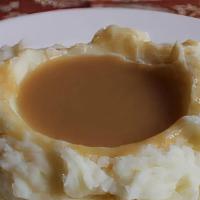Mashed Potatoes · Southern Styled Mashed Potatoes cooked to perfection.