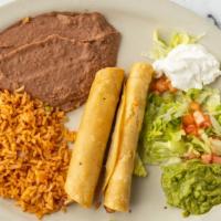 Flauta Plate · One chicken flauta served with rice and beans.