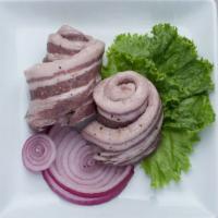 Red Wine Samgyupsal · Red wine pork belly. Contains raw meat.