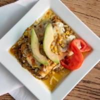 Green Corn Chicken Enchilada Dinner · With tomatillo sauce, Jack cheese, fresh corn kernels and avocado slices.