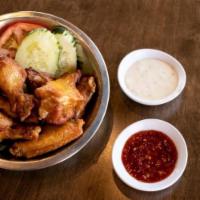 106 Chicken Wings (6 Pcs) · Crispy deep- fried chicken wings seasoned with Vietnamese spices.