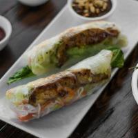 218 Chicken Spring Rolls · Two refreshing rolls filled with vermicelli, lettuce, carrots, with chicken wrapped in rice ...