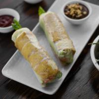 385 Veggie Tofu Spring Roll · Two refreshing rolls filled with vermicelli, lettuce, carrots, with tofu wrapped in rice pap...