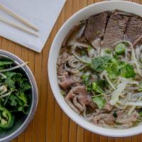 13 Rare Steak And Brisket · Slowly simmered Vietnamese beef broth served with rice noodles, with rare steak and brisket ...