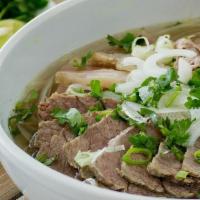 16 Combination · Slowly simmered Vietnamese beef broth served with rice noodles, with rare steak, brisket, te...