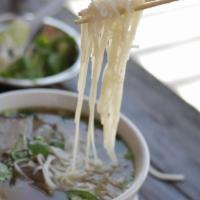 15 Rare Steak And Tendon · Slowly simmered Vietnamese beef broth served with rice noodles, with rare steak and tendon, ...