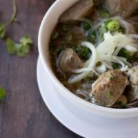 17 Meatball · Slowly simmered Vietnamese beef broth served with rice noodles, with meat ball and garnish.