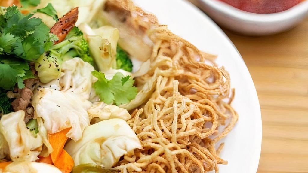 378 Crispy Or Soft Noodle · Stir-fried broccoli, carrots, and onions with shrimp and your choice of beef, chicken, or tofu,  on a bed of crispy or soft yellow egg noodles.