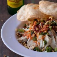 400 Chicken Salad · Shredded chicken, shrimp, and cabbage topped with peanuts, shrimp chips, pickled daikon and ...