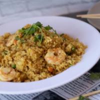 260 Vietnamese Fried Rice · Vietnamese fried rice with carrots, peas, and up to two proteins- chicken, pork, or shrimp- ...