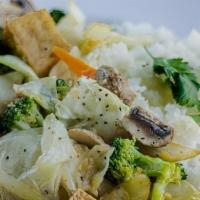 200 Vegetarian Pan Fried Tofu Mix · Fried tofu cubes with cabbage, carrots, and broccoli served with jasmine rice.
