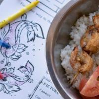 Kids Shrimp Skewer Bowl · Small portion of jasmine rice with a shrimp skewer and veggies