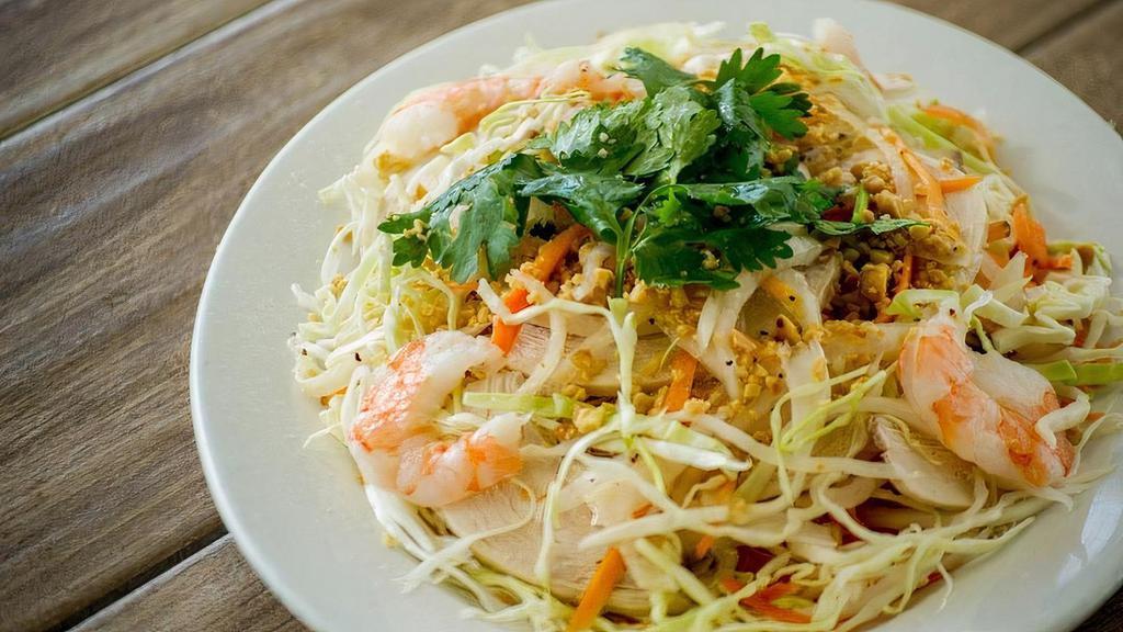 400 Vietnamese Salad · Vietnamese Cabbage salad mixed with pickled carrots, chicken, and shrimp, in a viet style vinaigrette