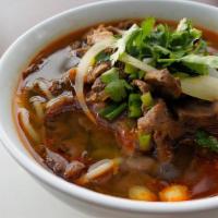 209 Spicy Beef Soup · Famous Central Vietnamese Dish. Has thick rice noodles, tendon beef in a beef broth topped w...