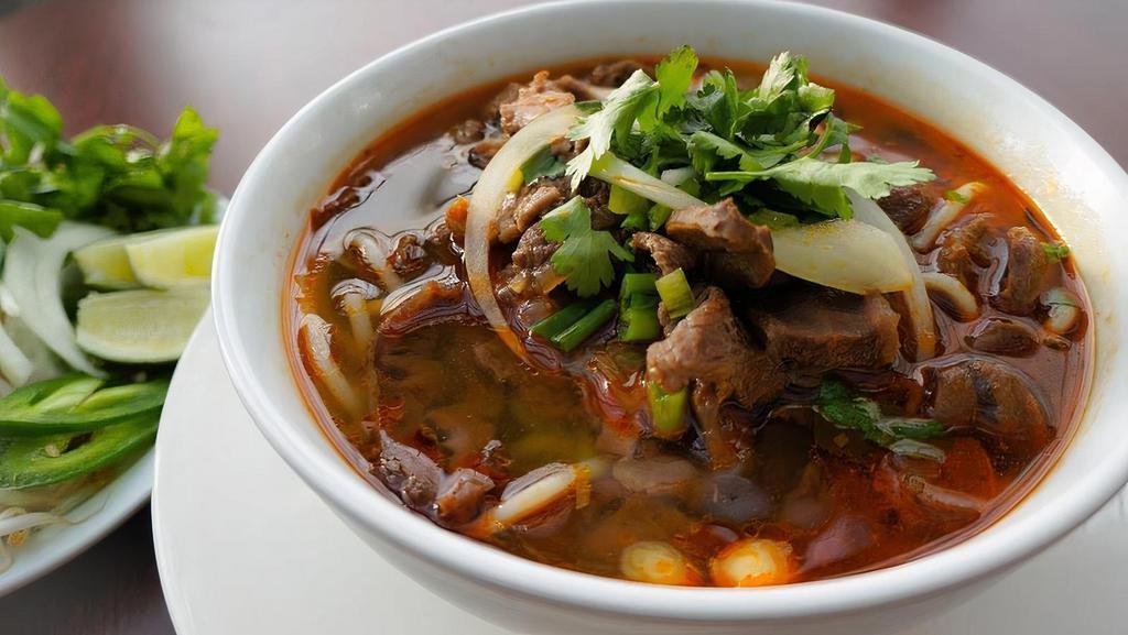 209 Spicy Beef Soup · Famous Central Vietnamese Dish. Has thick rice noodles, tendon beef in a beef broth topped with cilantro and onions.