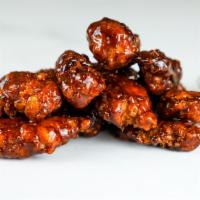 12 Crispy Boneless Wings · 12 Crispy boneless chicken wings tossed in sauce and served with homemade buttermilk ranch, ...