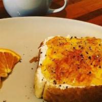 Lady Marmalade Toast · Ricotta cheese, orange marmalade topped with black pepper.