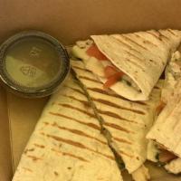 Chicken Pesto Quesadilla · Flour tortilla with grilled chicken, homemade basil pesto and Pepper Jack cheese. Comes with...