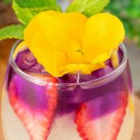 Butterfly Lemonade · Fresh squeezed lemonade, agave nectar, butterfly tea, fresh strawberries