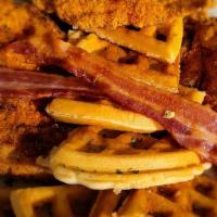 Reel Splash & Waffle(2 Fillets) · 2 JUICY CATS FRIED TO PERFECTION W/WAFFLE/2 EGGS/AND TOTS