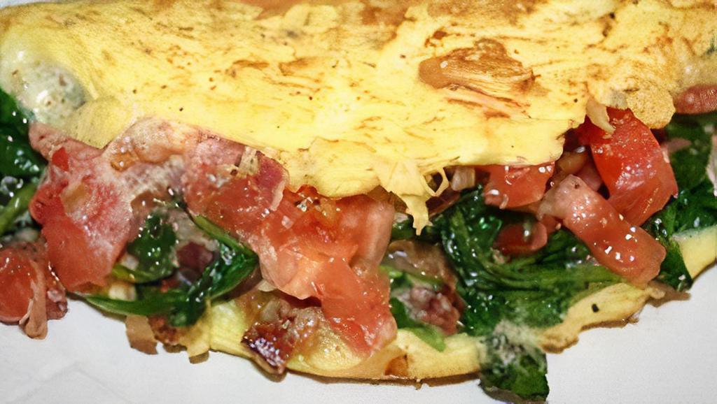 Bacon & Cheese Omelette · TRY OUR TRAP SIZED OMELETTES!
4 EGG OMELETTES MADE YOUR WAY
WITH TOTS INCLUDED