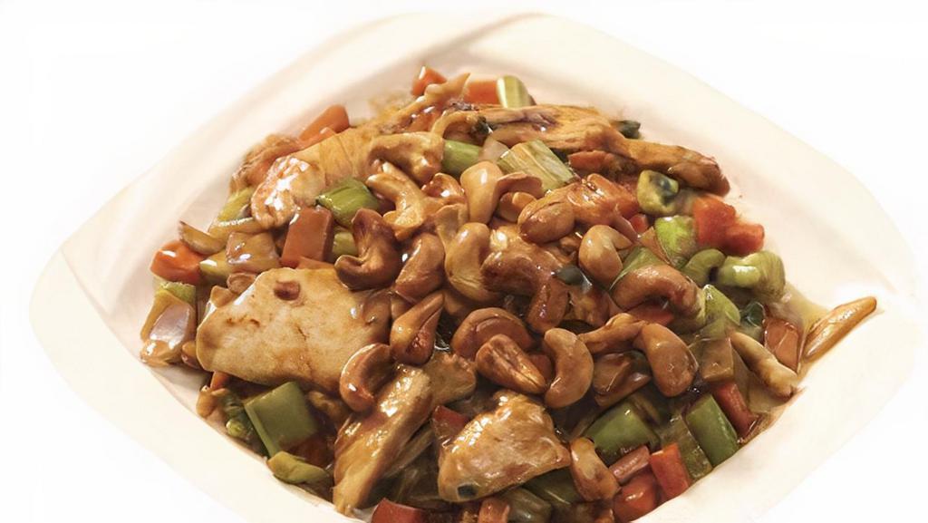 Almond Or Cashew · Celery, zucchini, carrots, bamboo shoots, peas in brown sauce.