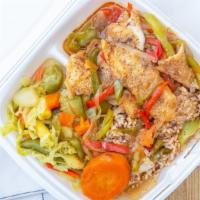 Tilapia Dinner  W/Rice & Peas And Cabbage · Curry, Steamed, Brown Stew, Escovitch or Grilled. Served with Rice & Peas and Cabbage **(Ste...