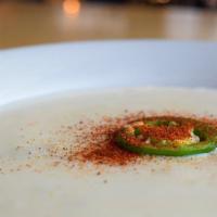 Habañero’S Queso · 16 oz of melted Queso blanco with green chili, red bell peppers and spices.