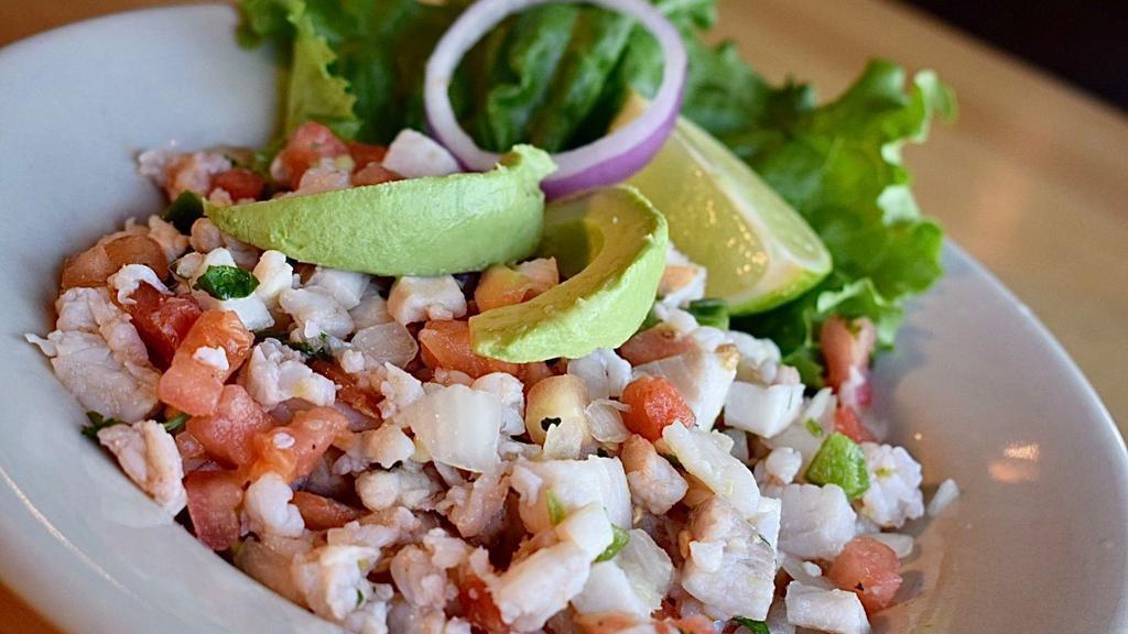 Fresh Ceviche · Made fresh daily from tilapia, shrimp, onions, tomatoes, cilantro and jalapeños seasoned and marinated in lime juice. Topped with avocado slices and served with saltine crackers.