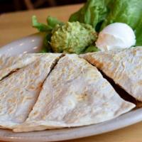 Quesadillas · A large grilled flour tortilla filled with jack cheese, mild pico de gallo and your choice o...