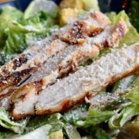 Mexican Caesar Salad · A large bowl of crisp romaine lettuce tossed in caesar dressing, shaved parmesan cheese and ...