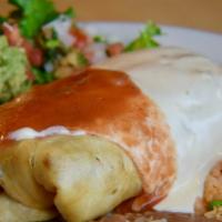 Chimichanga · A hand rolled large flour tortilla filled with grilled fajita steak or chicken, onions, bell...