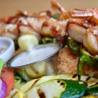 Cabo Shrimp · 6 butterflied jalapeño shrimp wrapped in bacon, cooked in lemon garlic butter and served ove...