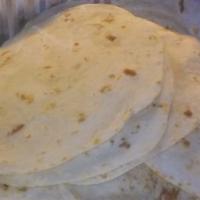 Extra Tortillas · Your choice of either 4 corn or 3 flour tortillas