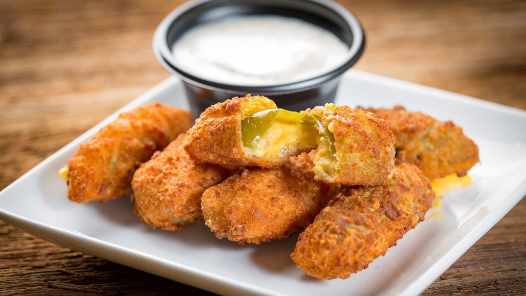 Jalapeno Poppers · Choice of cream cheese or cheddar filling. Served with ranch dressing for dipping.