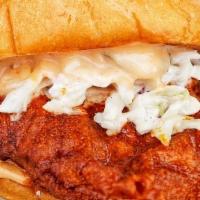 Howdy Sammie · Fried chicken breast on brioche bun with howdy slaw, sweet pickles and howdy sauce.