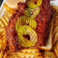 Howdy Basket · Two chicken tenders served with waffle fries, white bread, sweet pickles and howdy sauce.