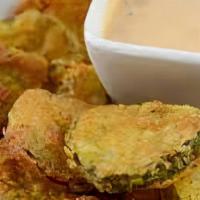 Fried Pickles · Classic Fried pickle chips served with ranch dip
